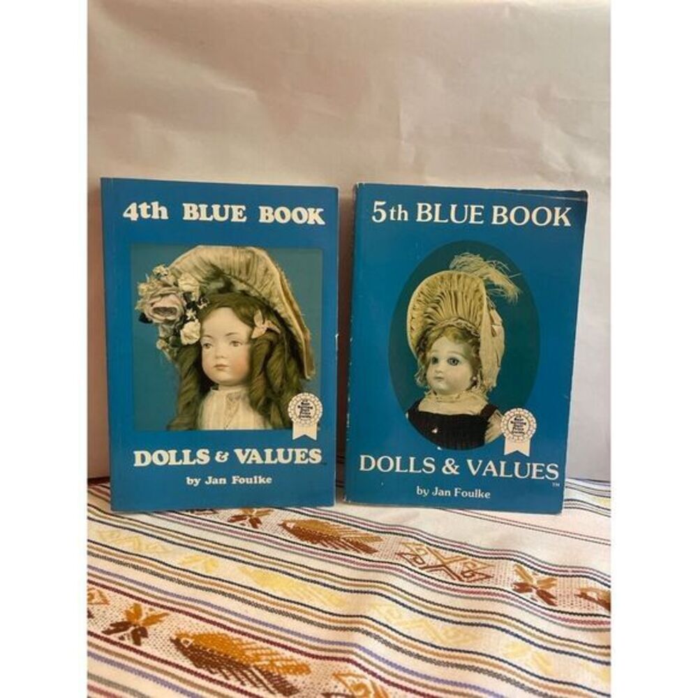 Hard to find set of blue book dolls & values 4th & 5th editions